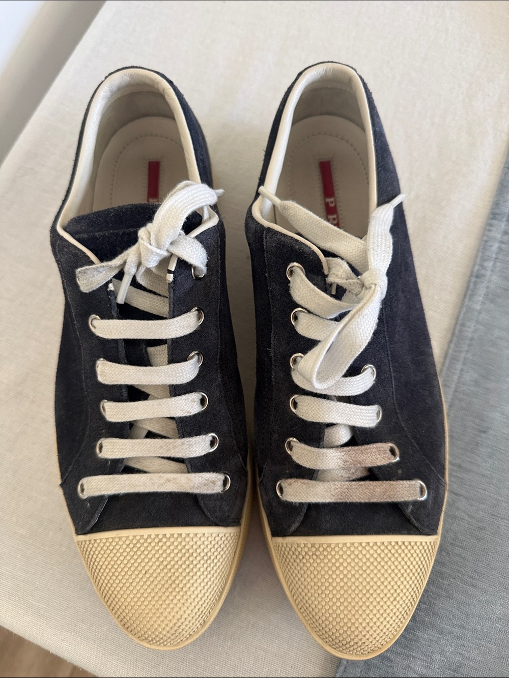Prada woman’s navy Suede Low-Top Sneakers with Cream Toe Cap